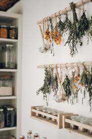 I have a ceiling mounted drying rack in my laundry room. Simple Diy Herb Drying Rack For Your Garden Herbs