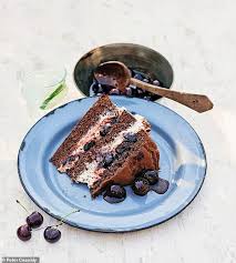 Despite being very low in fat it has a lovely light, moist texture, thanks to the dried dates, and makes a pleasant alternative to a conventional fruited cake. James S Jaunt Around Britain Chocolate Cherry Gin Cake Daily Mail Online