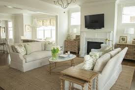light gray skirted sofas with sage