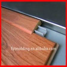 End caps are often used to transition from vinyl flooring to a sliding glass door or another vertical surface where you wouldn't put a baseboard (ex. Floor End Cap Molding Global Sources