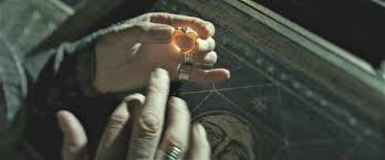 why-is-dumbledores-hand-black