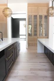 Modern kitchen room with oak cabinets. Rising Stars White Oak Kitchens Bandd Design