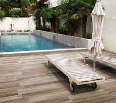 outdoor pool patio with porcelain tile