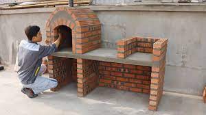diy pizza oven with red brick and
