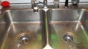 unclog a double kitchen sink drain