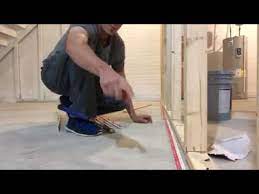 installing carpet strips on concrete