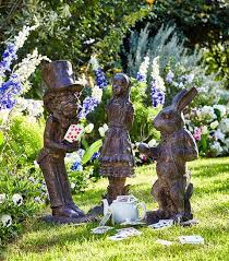 Rabbit statues is at alice in the doorknob character from ebay feed. 12 Fabulous Alice In Wonderland Inspired Home Pieces