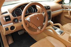 black steering wheel with sand beige