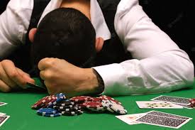 Premium Photo | Devastated gambler man losing a lot of money playing poker  in casino, gambling addiction. divorce, loss, ruin, debt, ludopata concept.