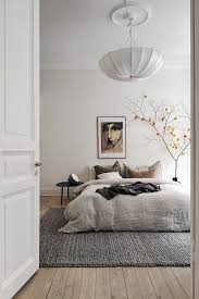 minimalist bedroom with white walls