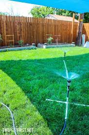 DIY Above Ground Sprinkler System | TwoFeetFirst