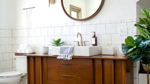 This wide bath vanity borrows elements of style from different eras. Tips For Using Repurposed Furniture As A Bathroom Sink Vanity Bruske Team