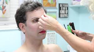 make up artist turns a man into a woman