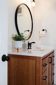 Along with the unusual tub shape, this modern farmhouse bathroom by chango & co. Modern Farmhouse Bathroom Landhausstil Badezimmer Boston Von Heather Nadeau Interior Design Houzz