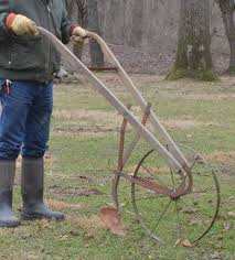 antique push furrow plow one metal