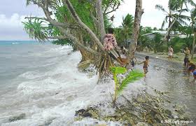 Tuvalu: Flooding, Global Warming, and Media Coverage - climate change, sea levels, coral reefs, sea erosion, Ellice Islands