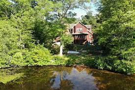 white heron lake house in the