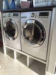 A simple platform to raise your washer and dryer off the ground is a simple project with plenty of rewards. I M So Excited To Be Posting My First Blog Post The Credit Goes To A Few Of My Girlfriends For Giving Laundry Room Pedestal Laundry Pedestal Laundry Room Diy