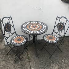 mosaic patio table and 2 chairs for