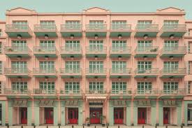 Premium Ai Image A Pink Building With