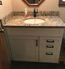 Bathroom vanity furniture is mounted to also save space instead of a separate cabinet placed freely. Kraftmaid Lyndale And Cambria Countertop Kitchen Chelsea Lumber Company
