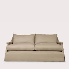 um emma sofa with kick pleat skirt
