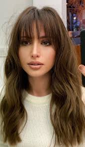 Have a heart or oval face shape? Cute Haircuts And Hairstyles With Bangs Cute Subtle Layered Haircut