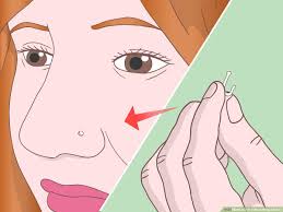 how to put a nose ring back in with