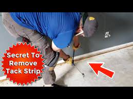 remove carpet tack strip from concrete