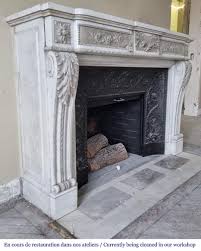 Semi Statuary Marble Fireplace