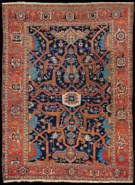 antique heriz carpet in a shaded indigo