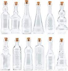 small mini clear vintage glass bottles