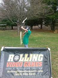 The game coach welcomes everyone inside and helps your guests. Mobile Game Party Rolling Video Games Of New England Archery Tag Www Rollingvideogamesct Com Party Party Games School Events