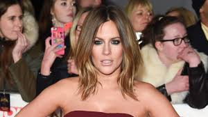 Caroline looked trendy in a tight black and white striped bardot top worn. Caroline Flack S Changing Hair She S Now Sporting A Short Bob