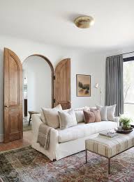 arched double doors into living e