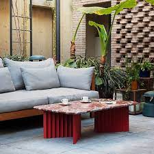 51 Outdoor Coffee Tables To Center Your