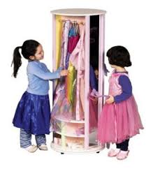 Features upper and lower storage with fabric bins for dramatic play items and a tall acrylic mirror. Guidecraft Dress Up Carousel Vs Kidkraft Swivel Vanity Which Is Best
