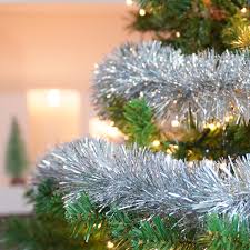 Ornamentation while tinsel is a shining material used for ornamental. 2m Fine Cut Tinsel Christmas Tree Decoration