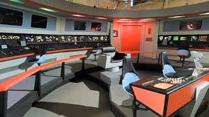 1 starfleet bridge design 1.1 features 1.1.1 command stations 1.1.2 flight control 1.1.3 operations management 1.1.4 security and tactical 1.1.5 supportive stations 1.2 22nd century bridge design 1.2.1 freedom class 1.2.2 nx class 1.2.2.1 command area 1.3 23rd century bridge design 1.3.1 kelvin type 1.3.2 walker. The Enterprise From Star Trek Is One Of Sci Fi S Most Famous Ships Step Foot On The Set Of The Enterprise S Bri Star Trek Continues Star Trek Star Trek Bridge