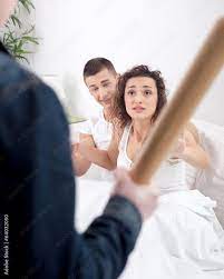 angry husband with baseball bat caught cheating wife with lover Stock Photo  | Adobe Stock