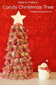 Small ring cakes with candy decorations. How To Make A Candy Christmas Tree