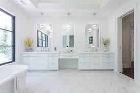 white bathroom vanity with makeup desk
