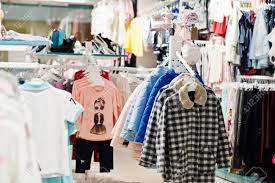 Maybe you would like to learn more about one of these? Children S Bright Clothes Hang On The Display In The Baby Clothing Store Girls Section Stock Photo Picture And Royalty Free Image Image 120997869