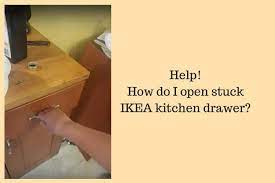 how do i open stuck ikea kitchen drawer