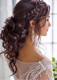 Nothing brings the party to the reception like this simple bun with colorful pin detailing. Wedding Reception Hairstyles Trending In Indian Weddings Wedmegood