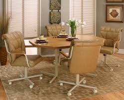 White kitchen chairs can go best with a white or grey background as well as with a contrasting background. Cramco Inc Cramco Motion Marlin Five Piece Dining Set Value City Furniture Dining 5 Piece Set