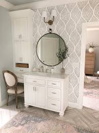 bathroom with wallpaper