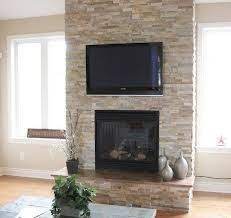 tv mount stacked stone fireplaces