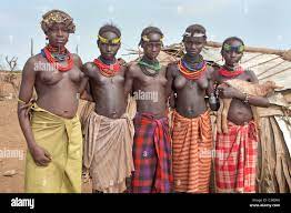 Dassanech, or daasanach, or dasenach people. Omorate, Omo river, Ethiopia,  Africa. Naked young girls and women Stock Photo - Alamy