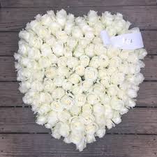 In the case of funeral flowers, you should direct the text to the deceased. Evans All White Rose Large Solid Funeral Heart By Evans Flowers
